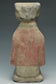 A HAN DYNASTY PAINTED POTTERY KNEELING ATTENDANT