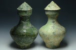 TWO LARGE HAN DYNASTY GREEN GLAZED HU VASES AND COVERS