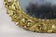 19TH CENTURY, AUSTRIA, FLORRENTINE OVAL GILT WALL MIRROR, 1810