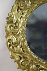 19TH CENTURY, AUSTRIA, FLORRENTINE OVAL GILT WALL MIRROR, 1810
