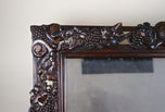 20TH CENTURY, AUSTRIA, BLACK FOREST WALL MIRROR, HAND CARVED, 1919
