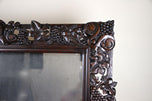 20TH CENTURY, AUSTRIA, BLACK FOREST WALL MIRROR, HAND CARVED, 1919