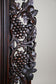 20TH CENTURY, AUSTRIA, BLACK FOREST WALL MIRROR, HAND CARVED, 1919