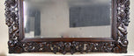 20TH CENTURY, AUSTRIA, BLACK FOREST WALL MIRROR, HAND CARVED, 1919