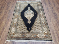 1950S PERSIAN SILK QUM RUG, SILK ON SILK, BLACK GOLDEN BROWN AND BEIGE, HAND-KNOTTED, 3'6" X 5' 5"
