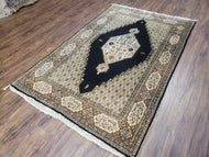 1950S PERSIAN SILK QUM RUG, SILK ON SILK, BLACK GOLDEN BROWN AND BEIGE, HAND-KNOTTED, 3'6" X 5' 5"