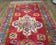 1950S ANTIQUE PERSIAN KARAJEH RUNNER RUG 4.4X11 FT, RED COLORFUL GEOMETRIC MEDALLION RUNNER