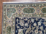 1950S SEMI ANTIQUE PERSIAN QUM TREE OF LIFE RUG, HAND-KNOTTED, WOOL, MIDNIGHT BLUE AND TAN, ANIMAL PICTORIALS, WRITTEN POEM IN BORDERS, 4' 8" X 7' 8"