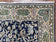 1950S SEMI ANTIQUE PERSIAN QUM TREE OF LIFE RUG, HAND-KNOTTED, WOOL, MIDNIGHT BLUE AND TAN, ANIMAL PICTORIALS, WRITTEN POEM IN BORDERS, 4' 8" X 7' 8"