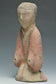 A HAN DYNASTY PAINTED POTTERY KNEELING ATTENDANT