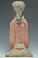 A HAN DYNASTY PAINTED POTTERY KNEELING ATTENDANT