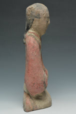 A HAN DYNASTY PAINTED POTTERY KNEELING ATTENDANT